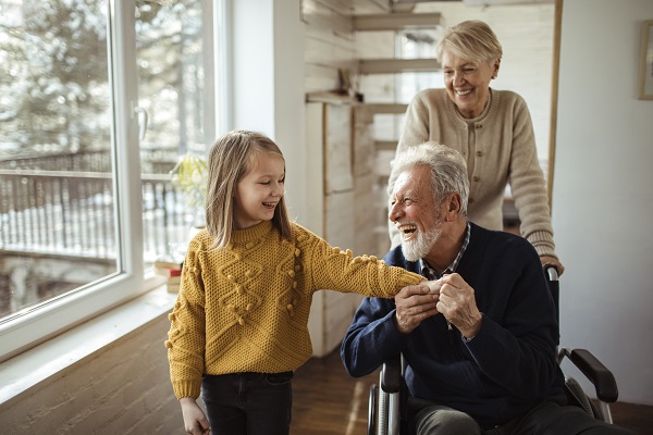 multi generational family enjoying time together at home during the winter